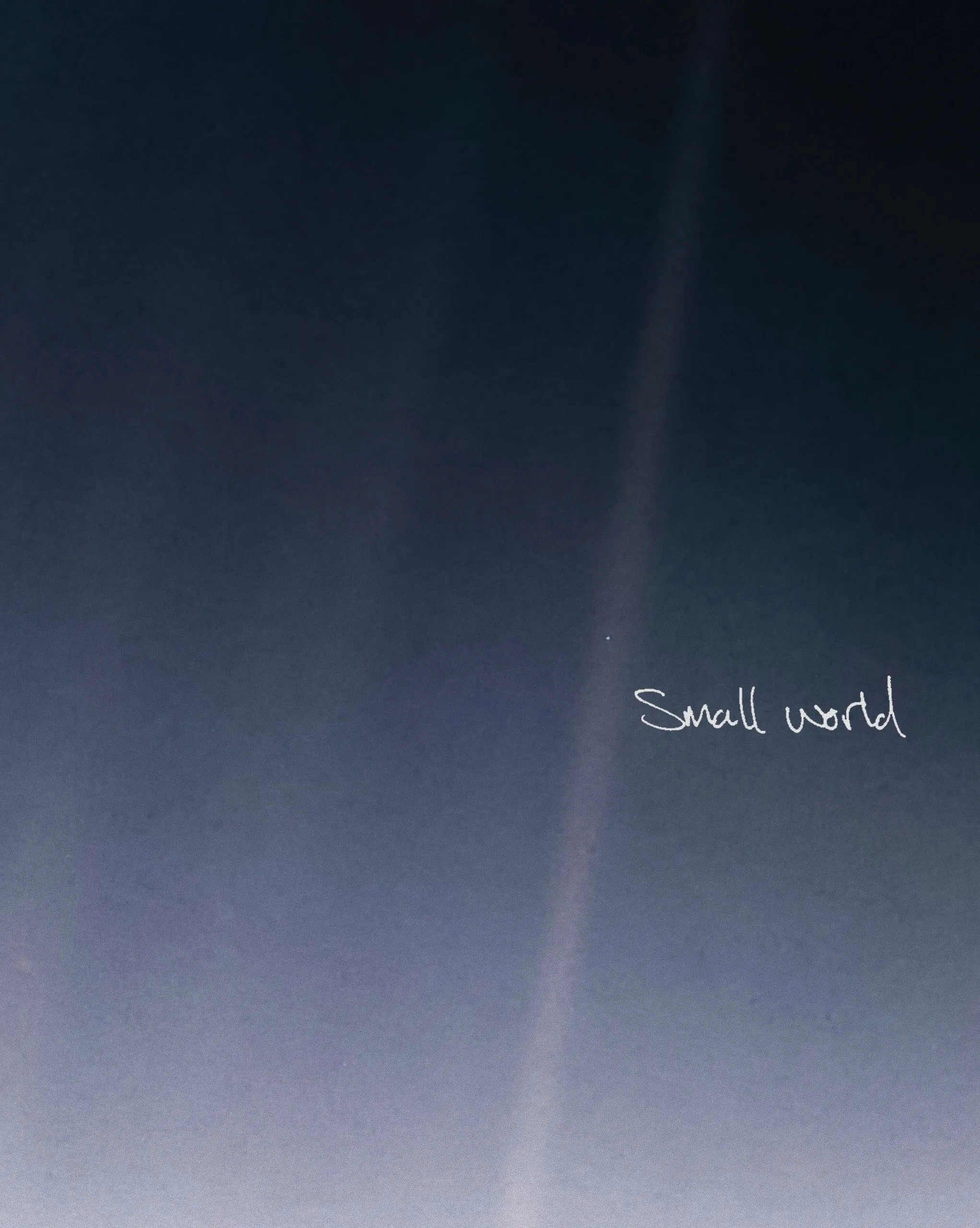 Dark blue background with a faint vertical light streak and the handwritten white text "Small world".